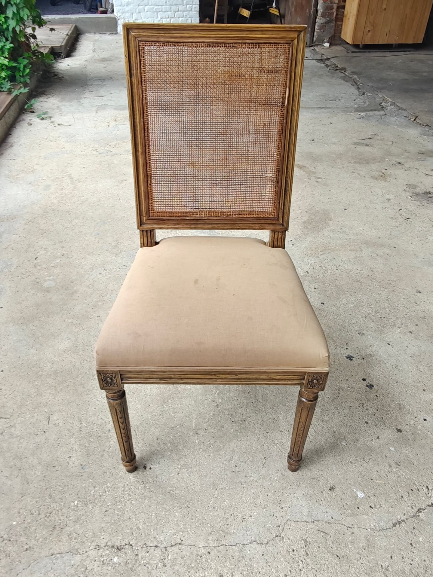 Set of 5 antique wooden and caned chairs.