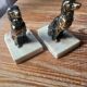 Metal and stone bookends