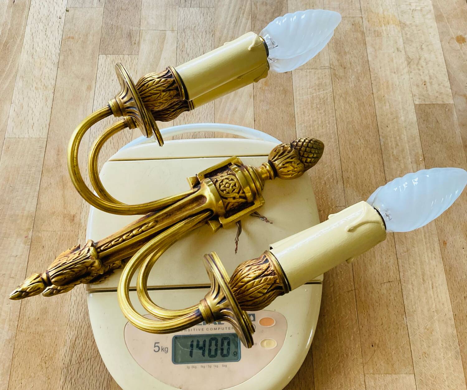 St Louis XVI gilded bronze wall lights with foliage and pine cone decorations