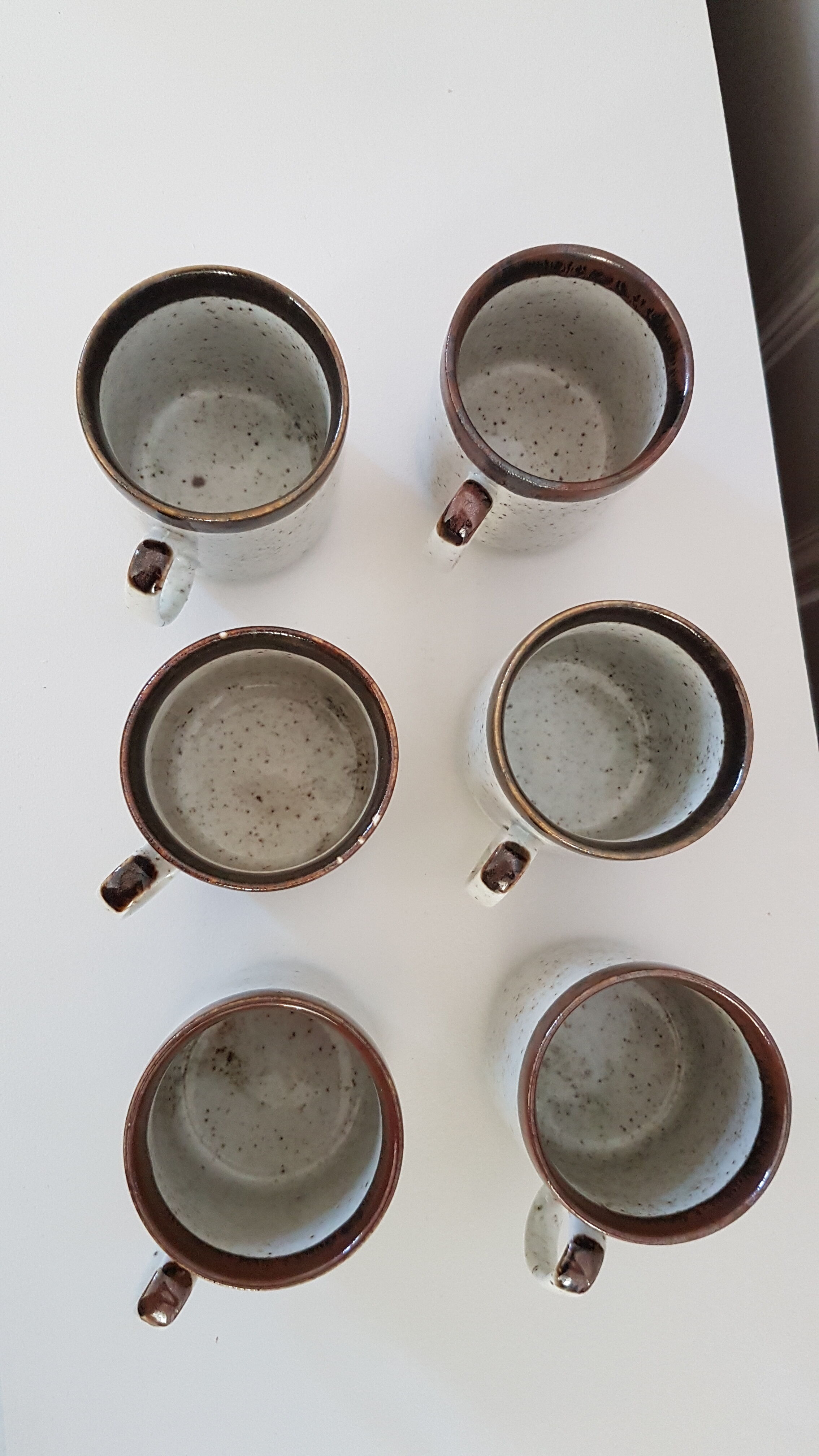 Six stoneware mugs