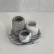 Set of marble candle holders with base