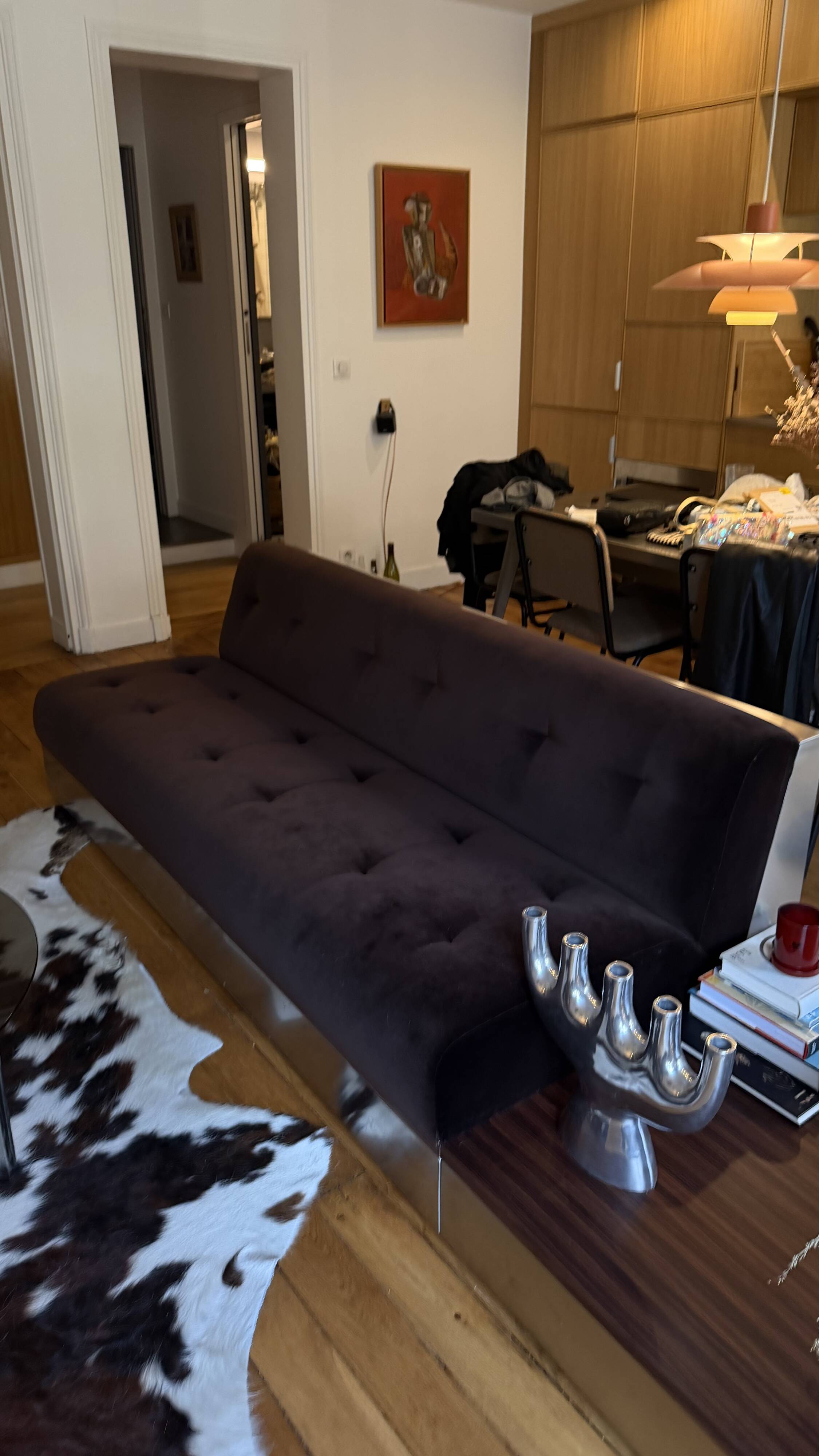 Red Edition Stanley 3-seater sofa with matching chocolate velvet storage.
