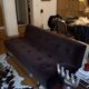 Red Edition Stanley 3-seater sofa with matching chocolate velvet storage.