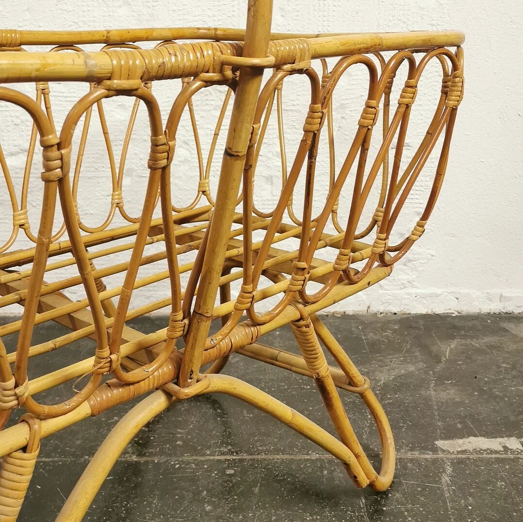 Baby cradle in vintage rattan