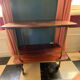 Elegant vintage serving trolley on wheels, two wooden shelves.