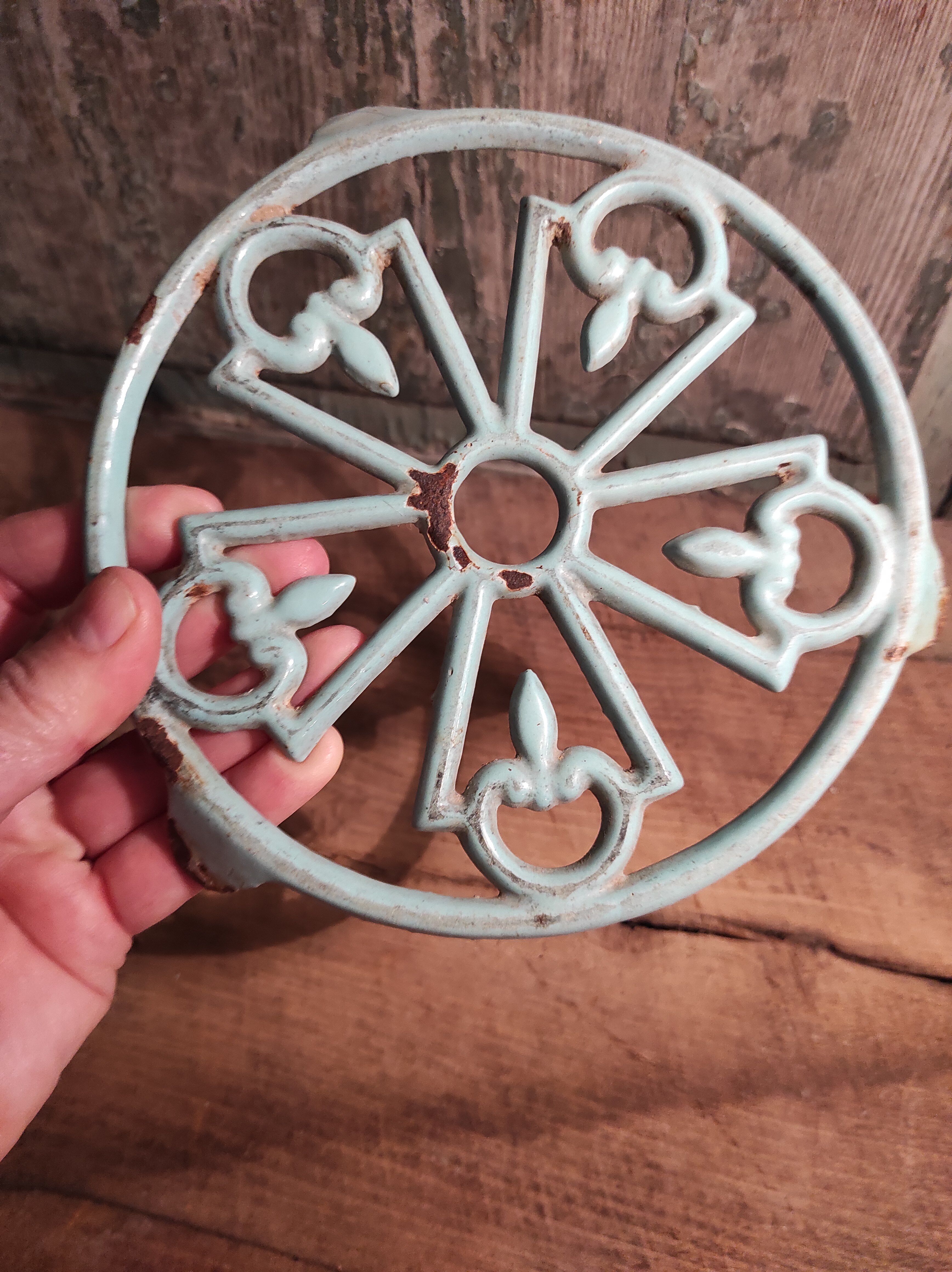 Vintage French light greenish blue cast iron table mat