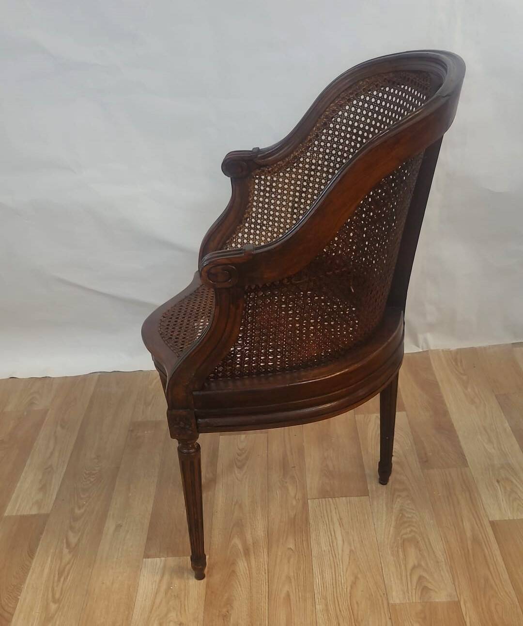 Carved wooden cane armchair – Louis XVI style
