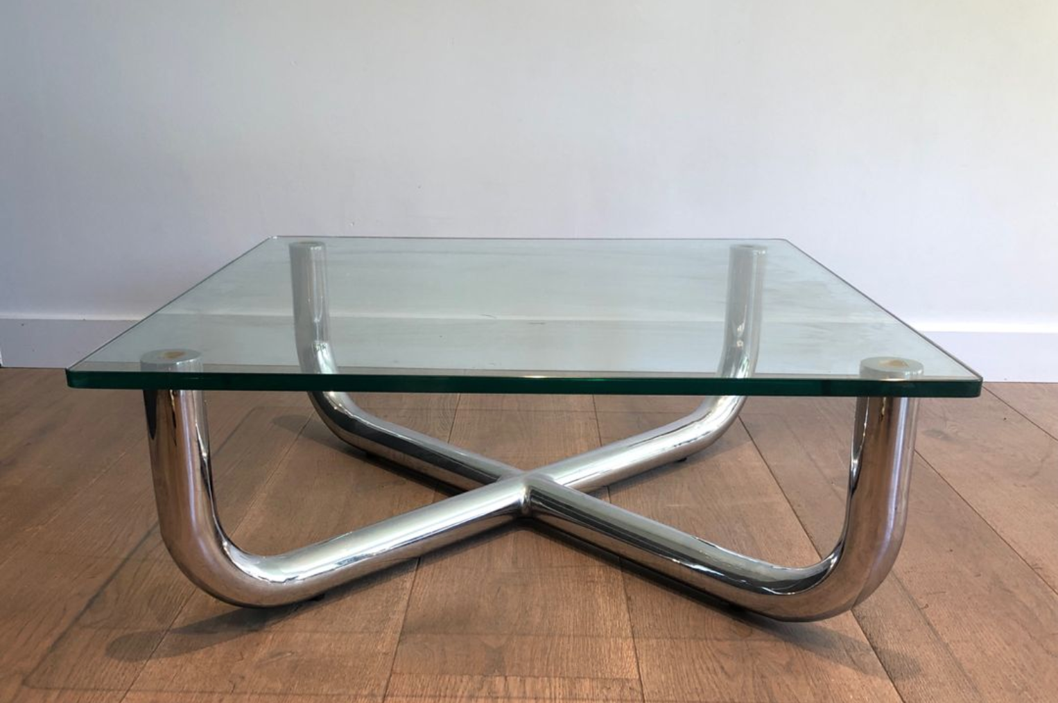 Chrome coffee table with a glass top