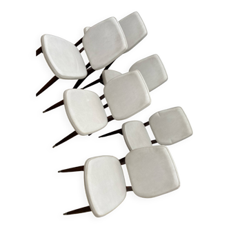 Vintage white chairs with wooden legs