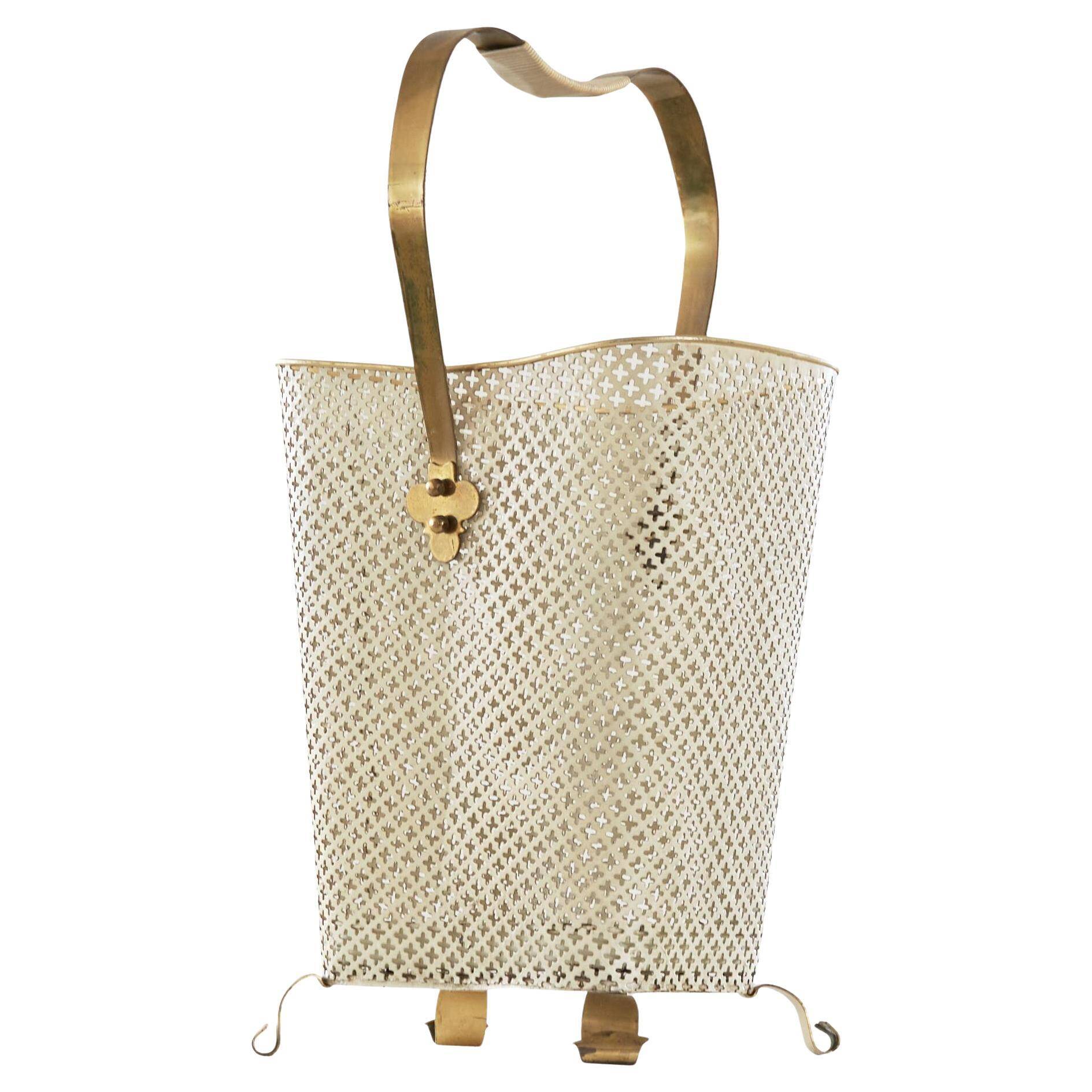 Mid-century umbrella stand in patinated brass and perforated metal, 1950s.