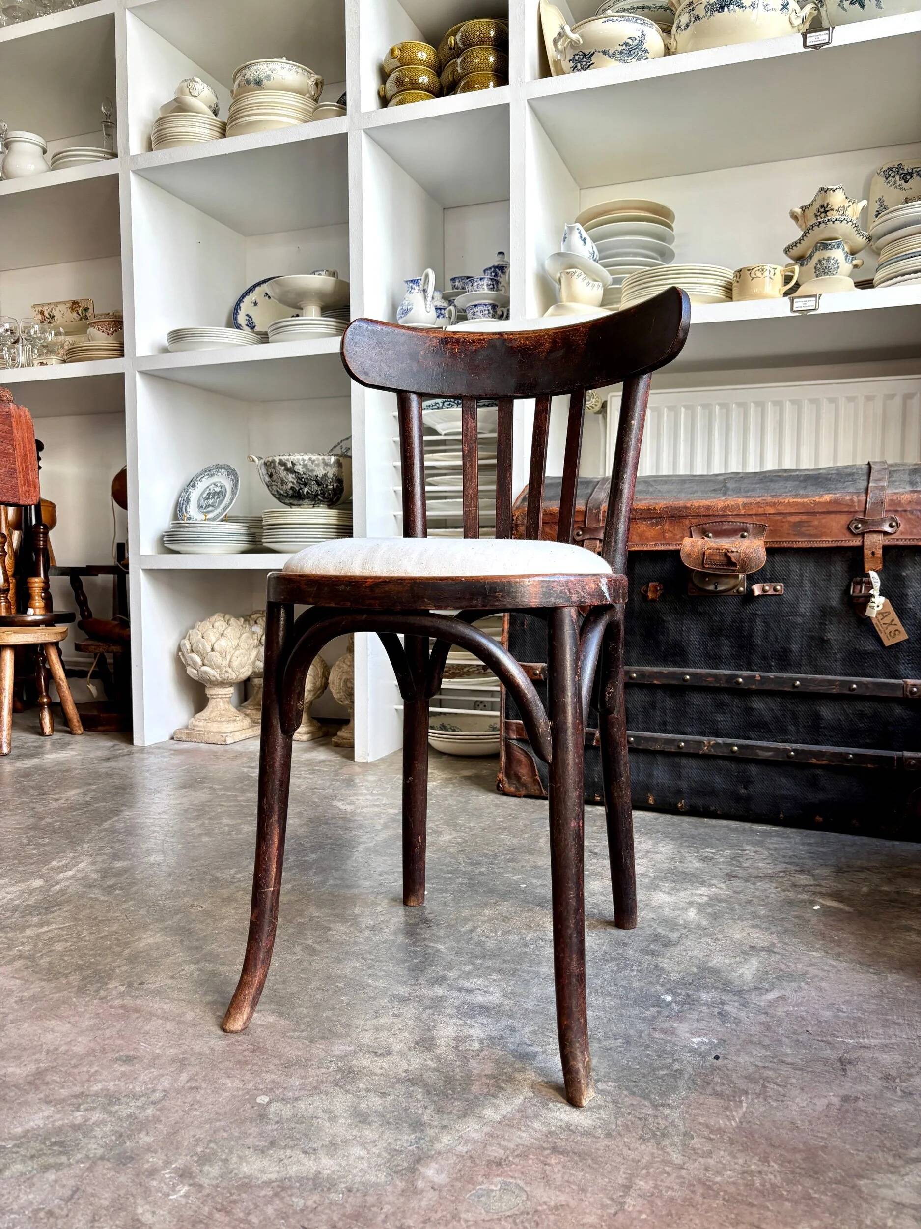 Bistro chair in bent beech and beige mixed fabric.