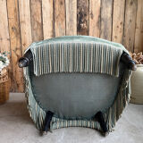 Green velvet tub chair