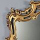Miroir ancien en bois sculpté et doré, Italie, début XXe siècle