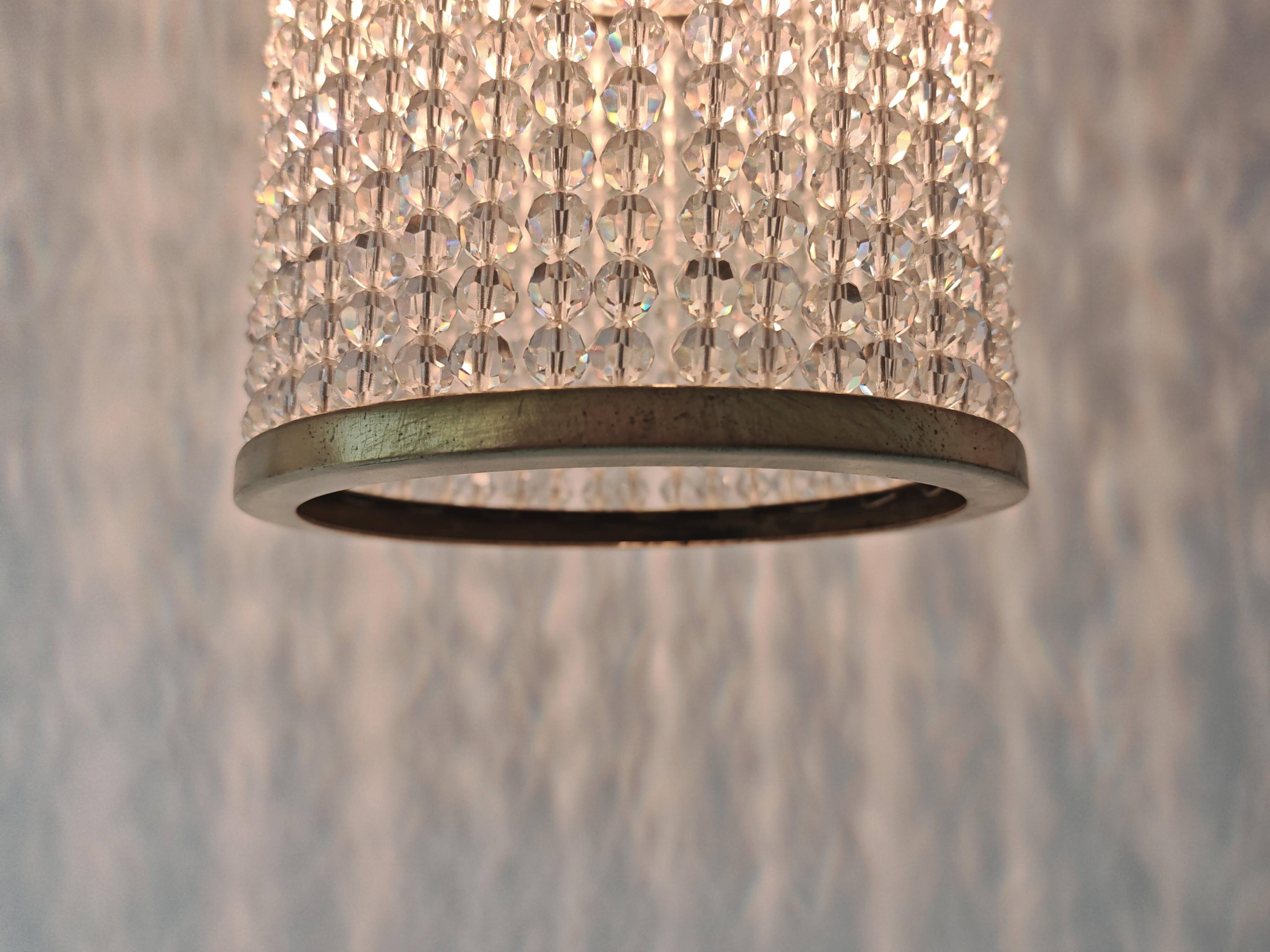Set of 3 cylindrical crystal chandeliers in mid-century modern style attributed to Lobmeyr.