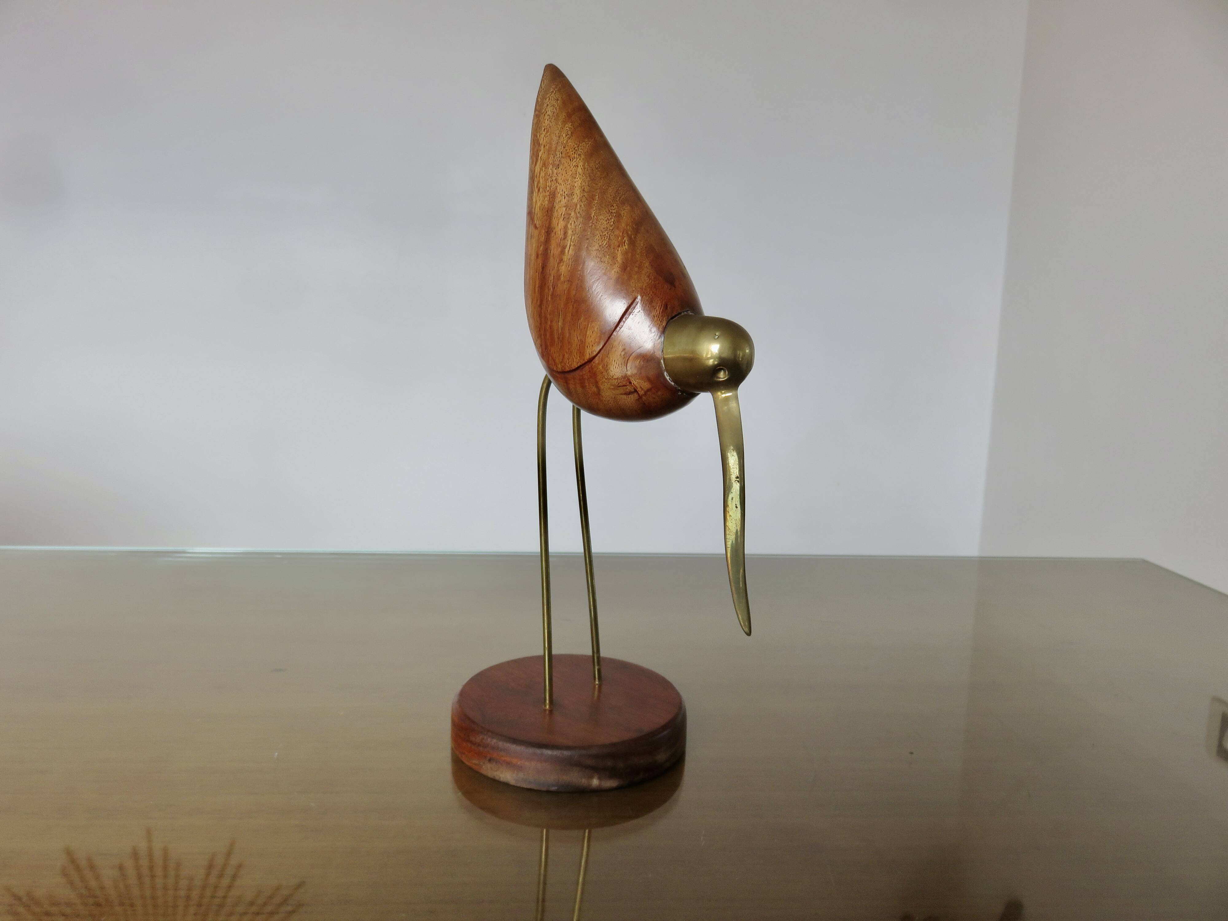 Scandinavian heron in teak and brass 1970