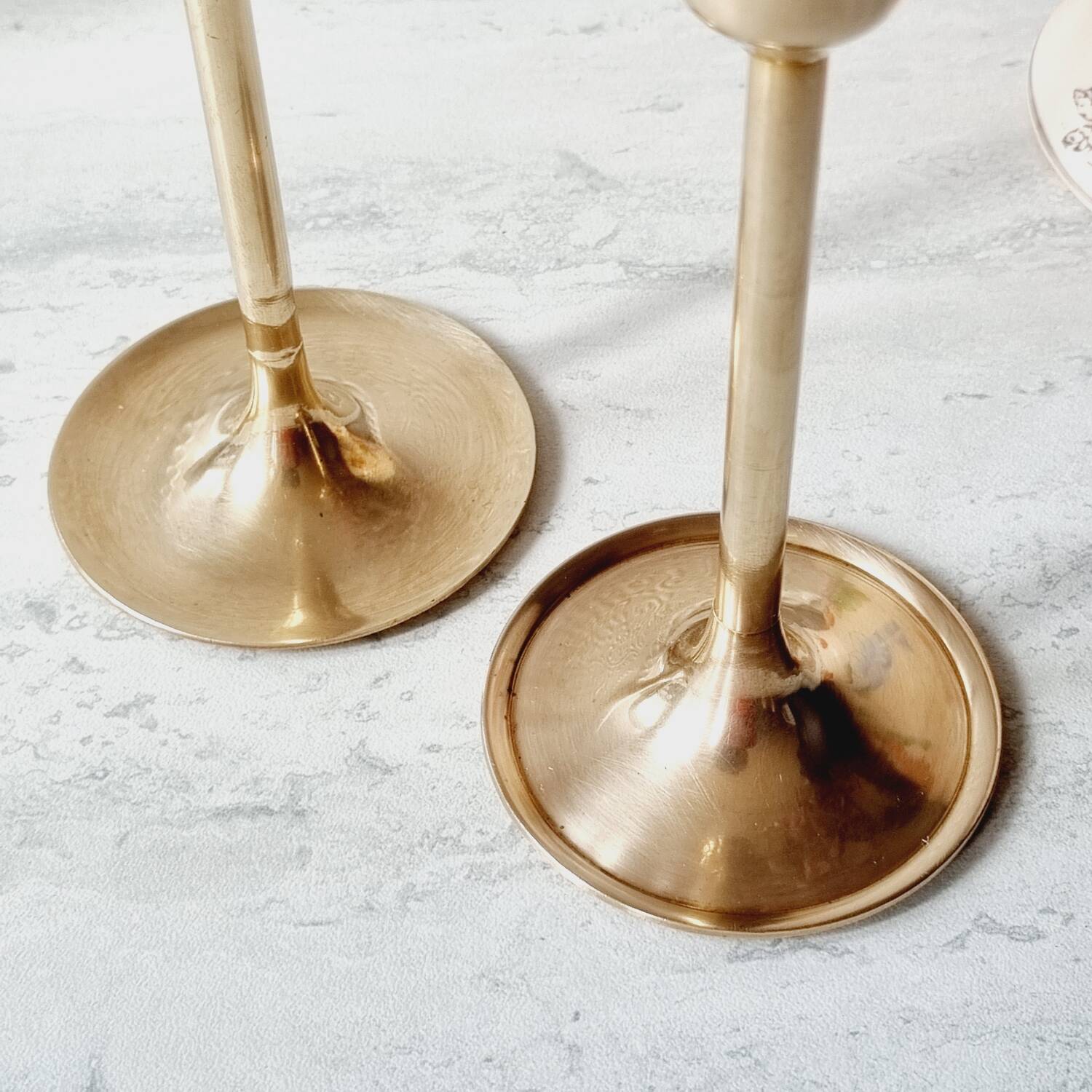 Duo of brass candlesticks