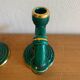 Pair of green and gold ceramic candlesticks