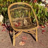 Pair of 1950s rattan armchairs from France.
