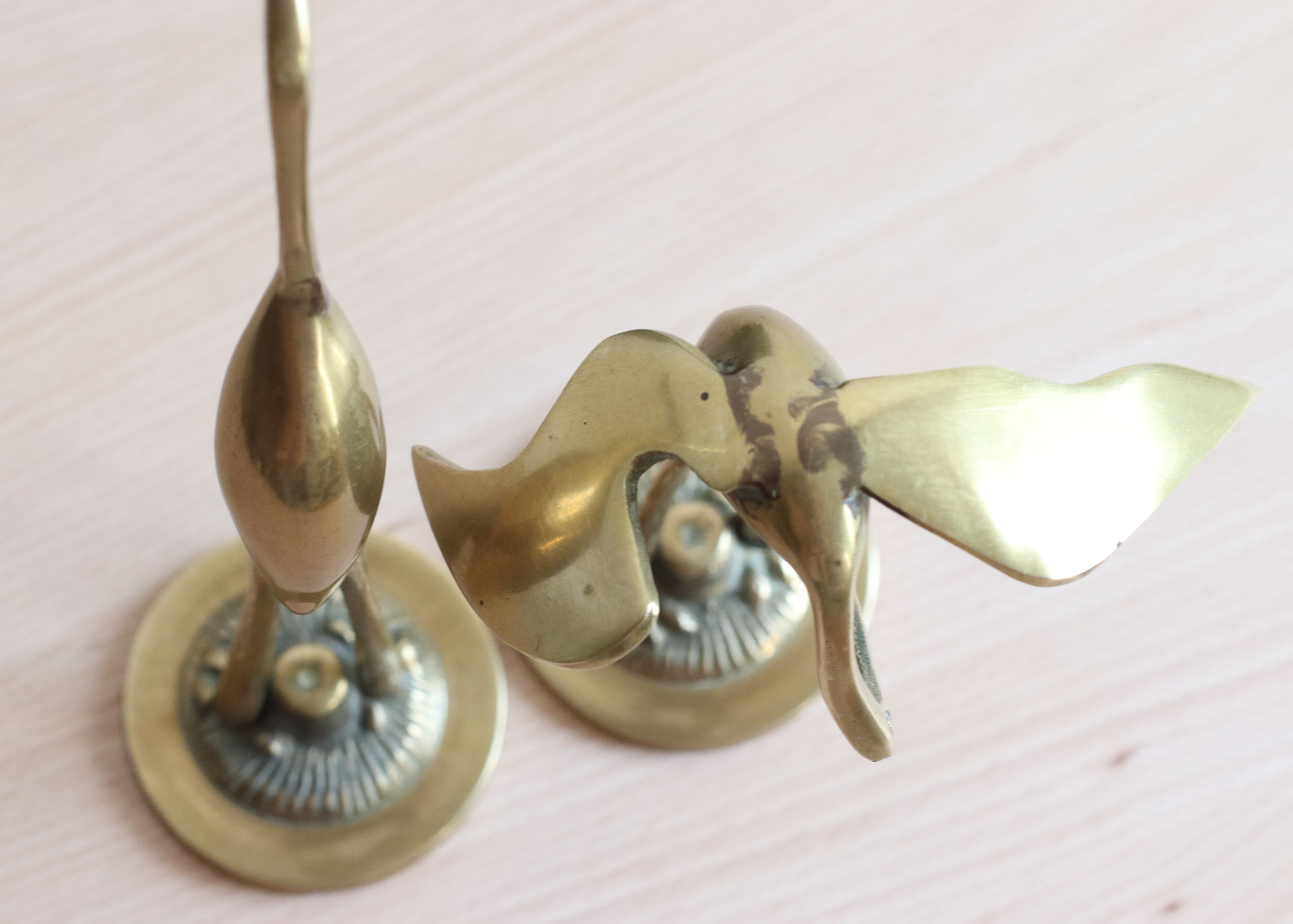 Couple of herons, golden brass