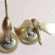 Couple of herons, golden brass