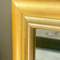 Wooden mirror, smooth and gilded