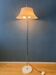 Vintage Space Age floor lamp with white plexiglass UFO shade.