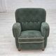 Fauteuil danois des années 1960, en laine de mobilier vert clair, avec des pieds en bois de chêne.