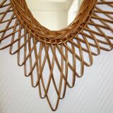 Miroir soleil ovale en rotin des années 60 taille 73x50cm
