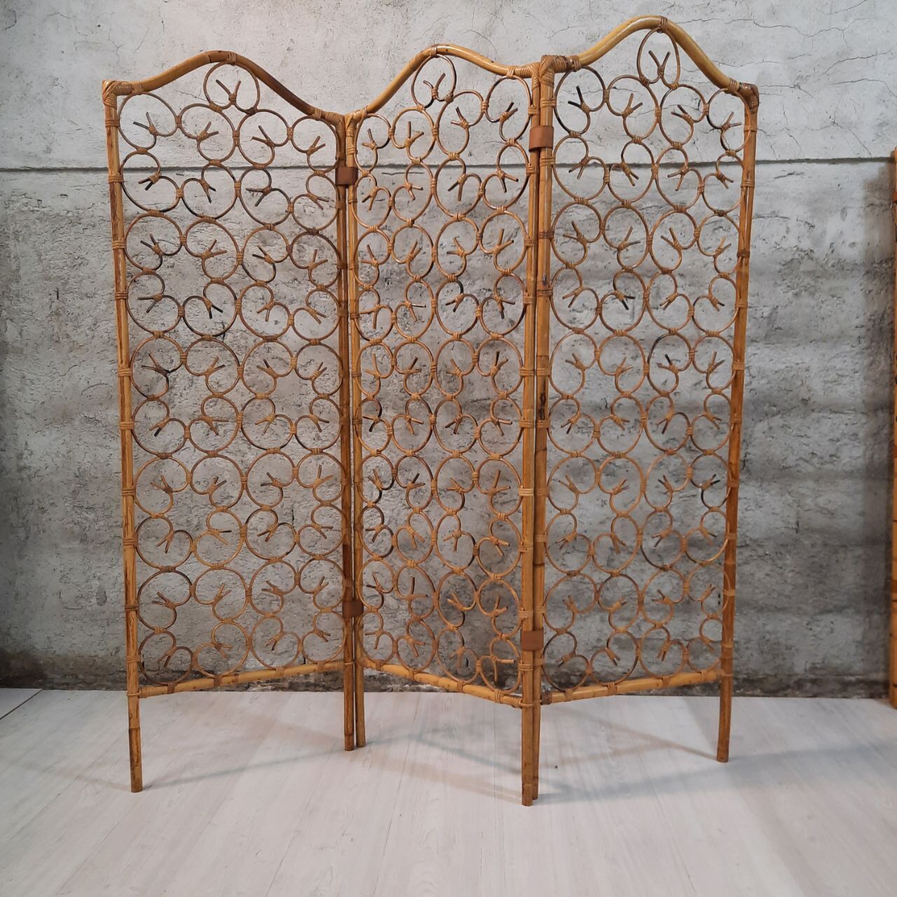 Vintage screen made of bamboo, wicker and leather