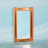 Vintage Danish wall mirror design from the 1960s in oak and stamped brass.