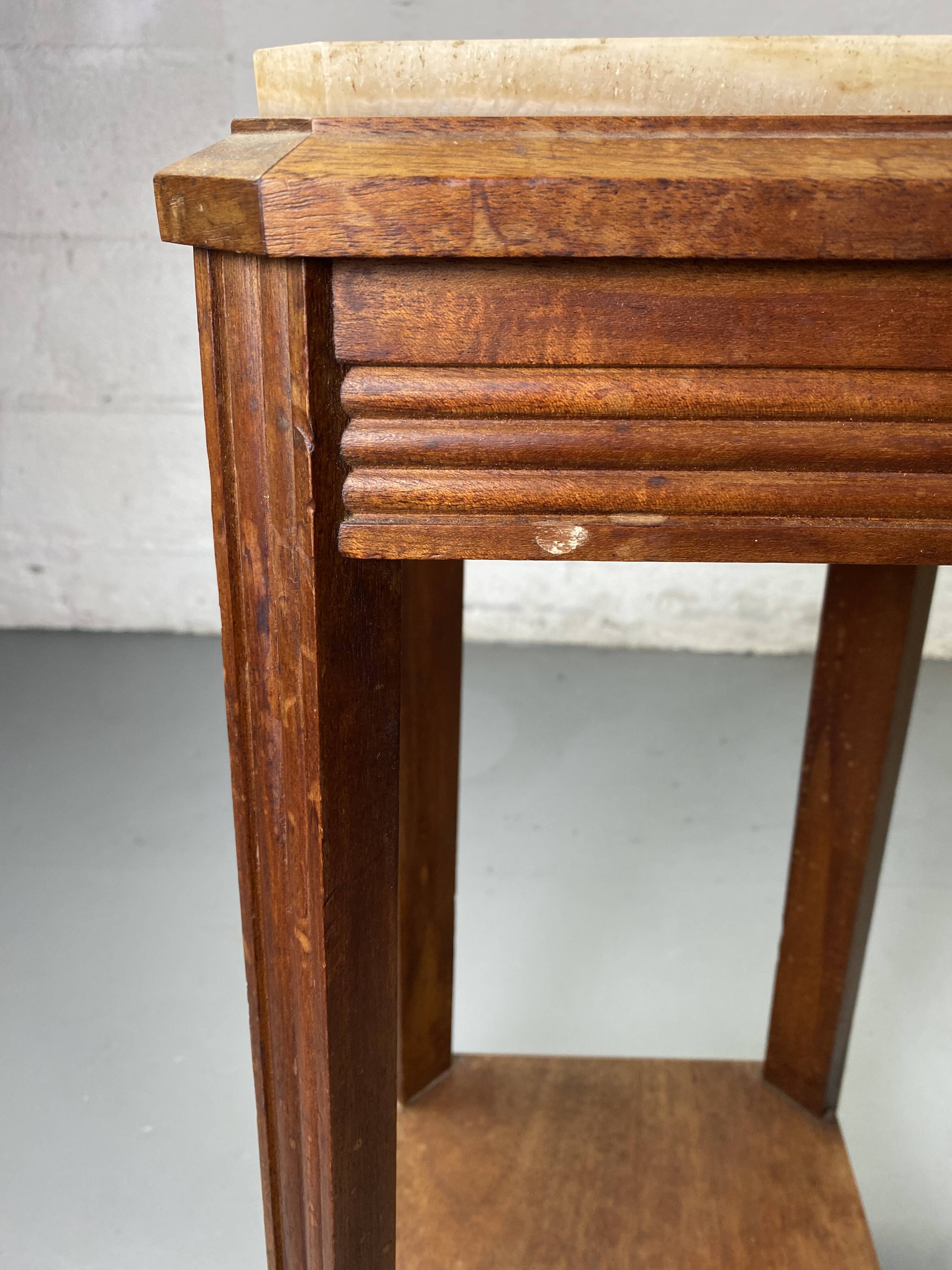 Wooden stool with marble top