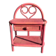 Chevet en rotin rose