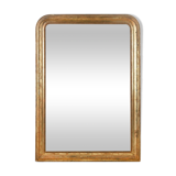 Mirror with golden patina