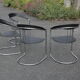 Quatre chaises avec accoudoirs style Arrben