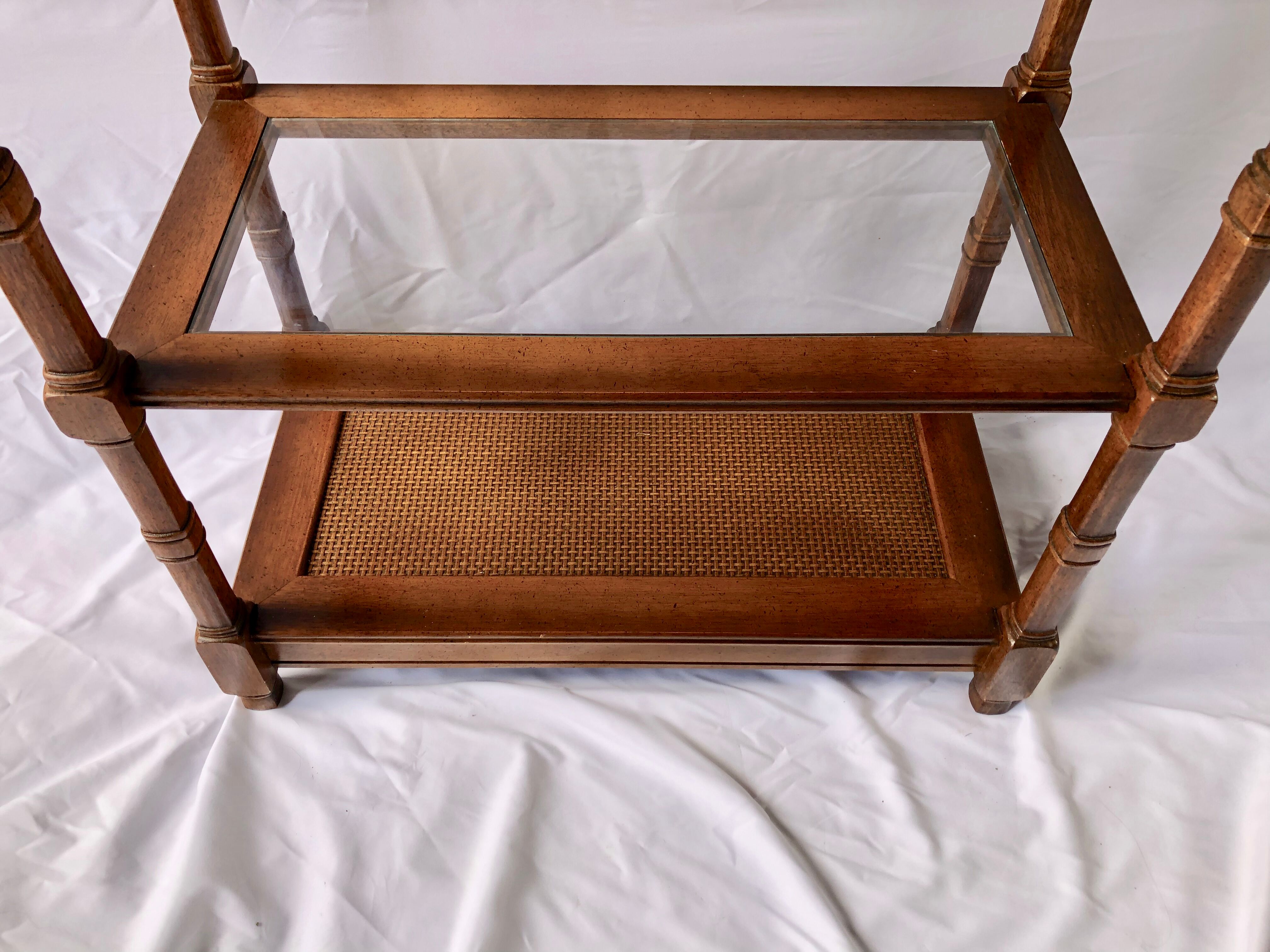 Classic wooden shelves, glass tops and cannage