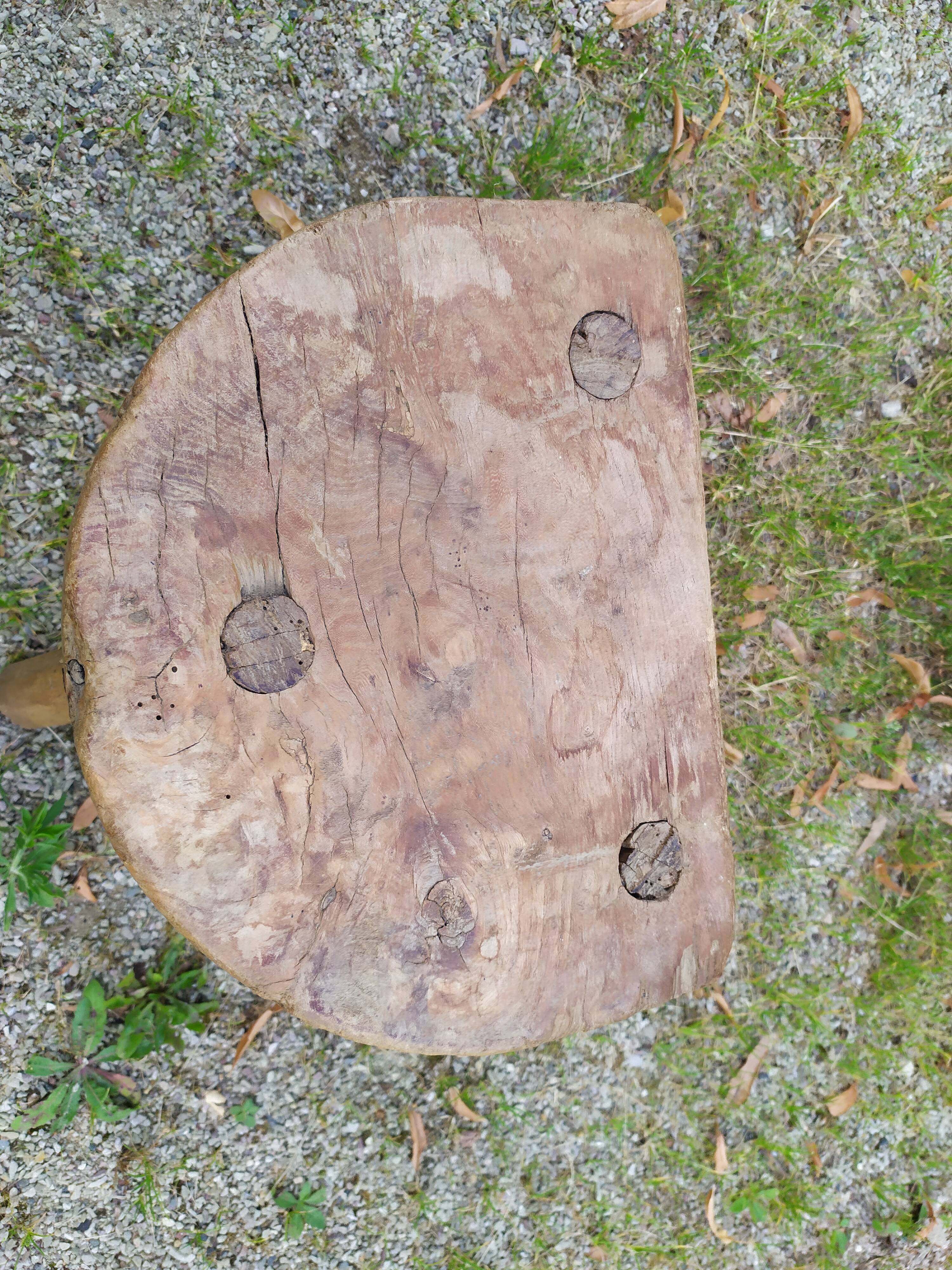 Tripod stool in raw wood