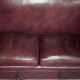Victorian Knole canapé restored in leather with feather cushions.