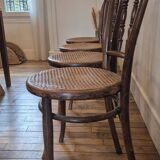 Set of 4 chairs signed Thonet with caning