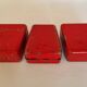 Set of three red painted metal railway boxes with SNCF logo
