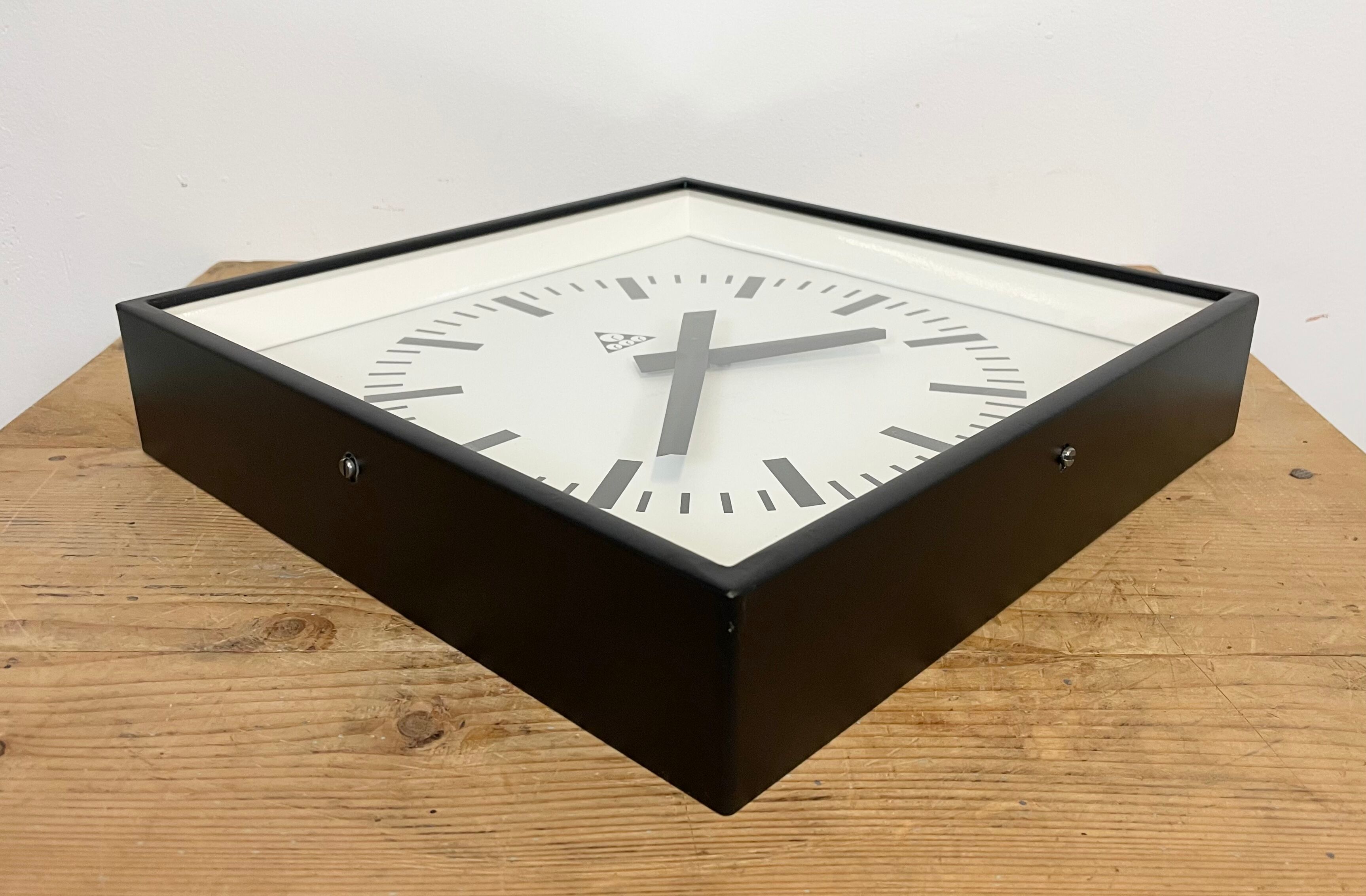 Black Industrial Square Wall Clock from Pragotron, 1970s
