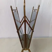 Neo-classical brass magazine rack in the spirit of Maison Jansen.