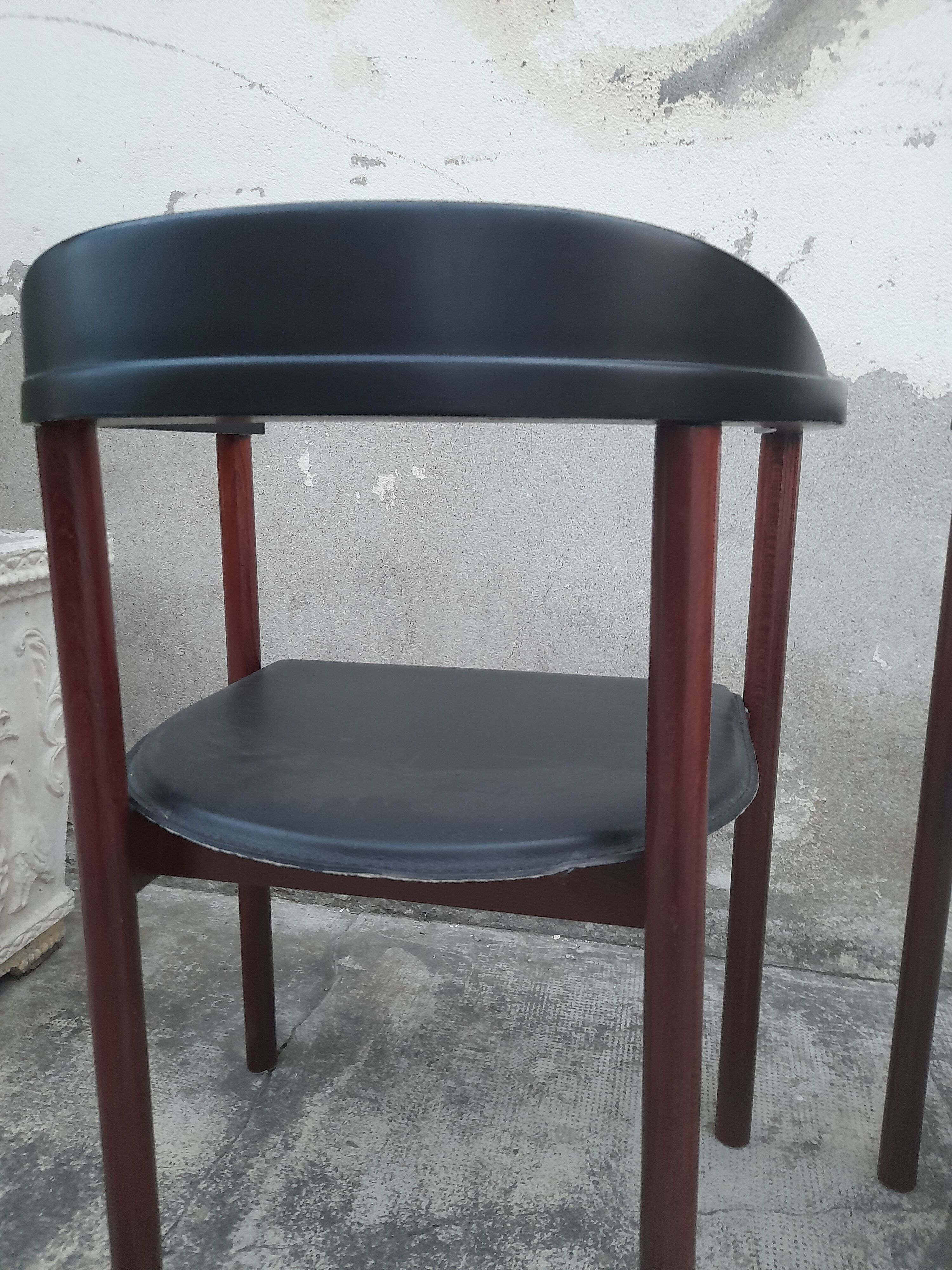 Pair of Scandinavian armchairs in teak and leather