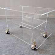 David Lange side table on wheels in plexiglass, France 1970.