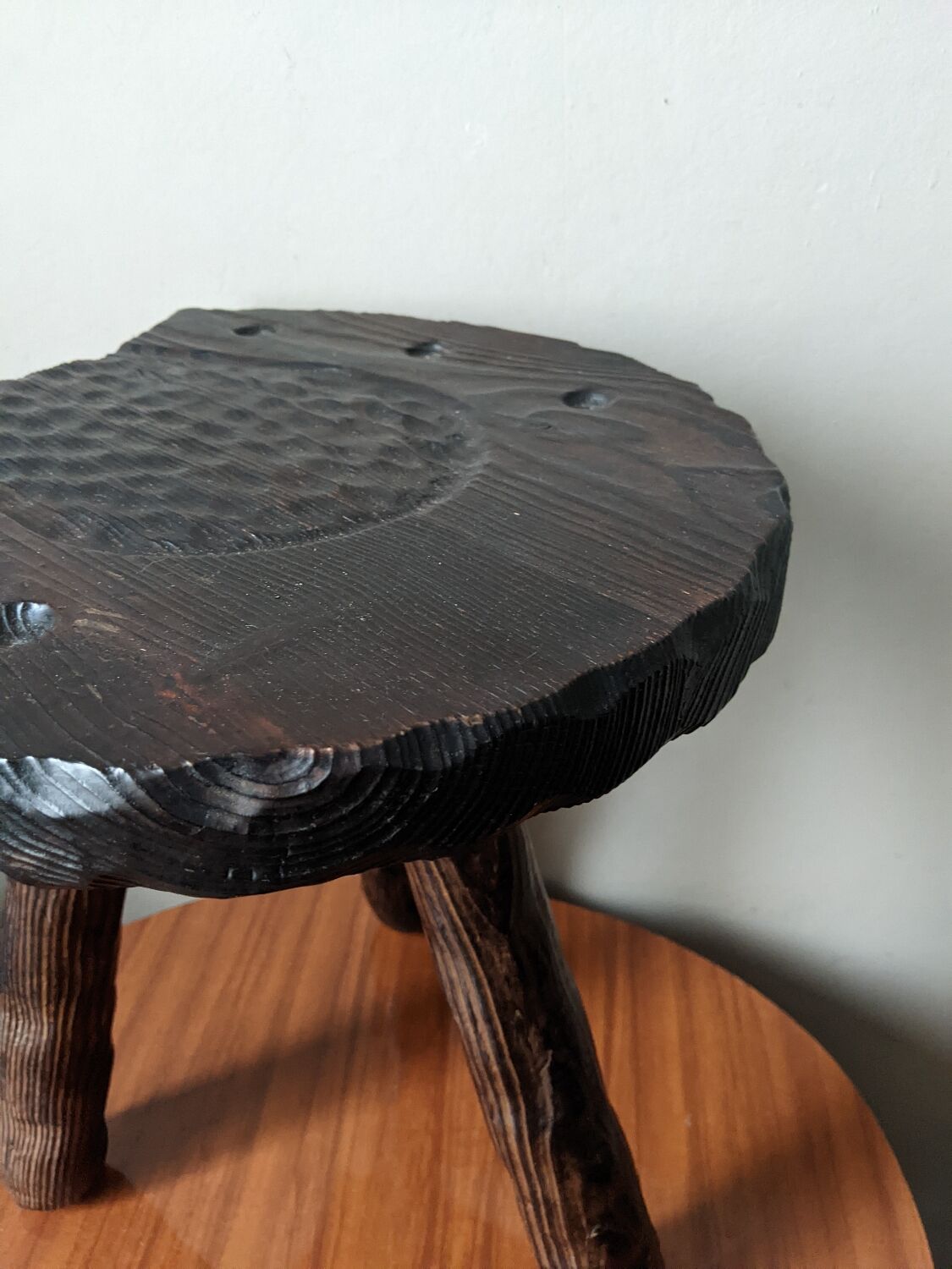 Tripod stool, horseshoe, rustic brutalist decoration.