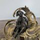 Pair of bronze fire dogs in the Louis XV style