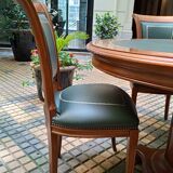 Round table type directoire green leather and its 4 chairs