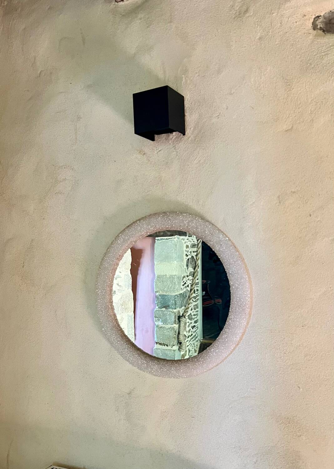 Round mirror in granite perspex, 1970s