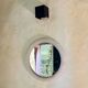 Round mirror in granite perspex, 1970s