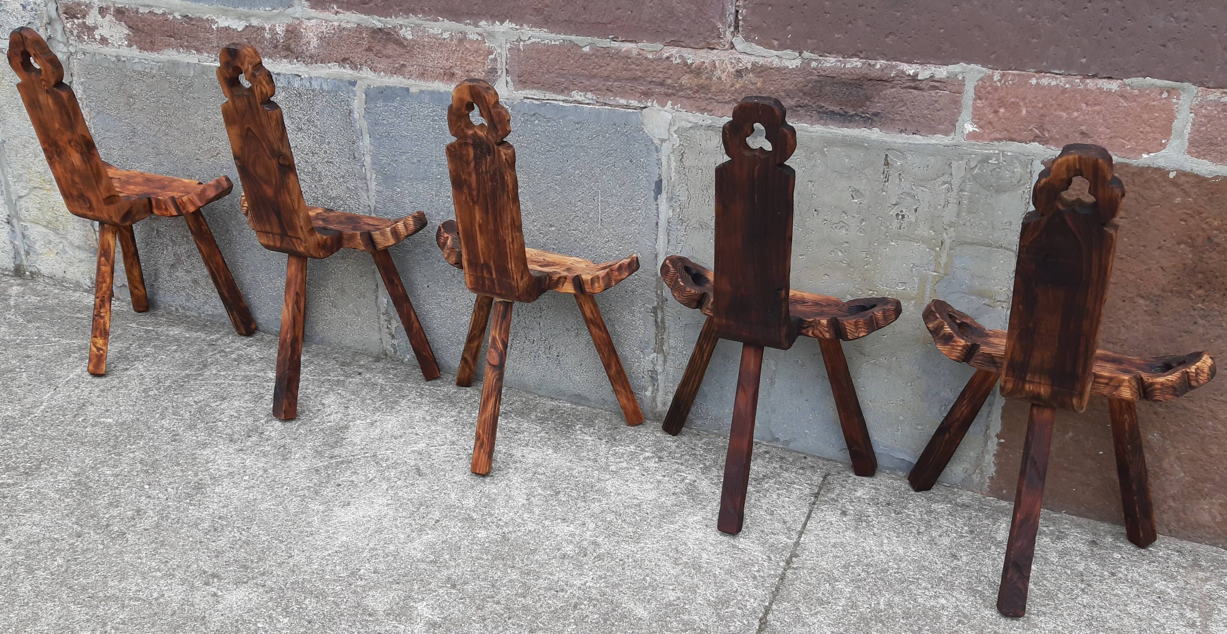 Set of 5 wooden tripod chairs