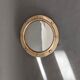 Witch porthole mirror 1940 in vintage gilded brass.